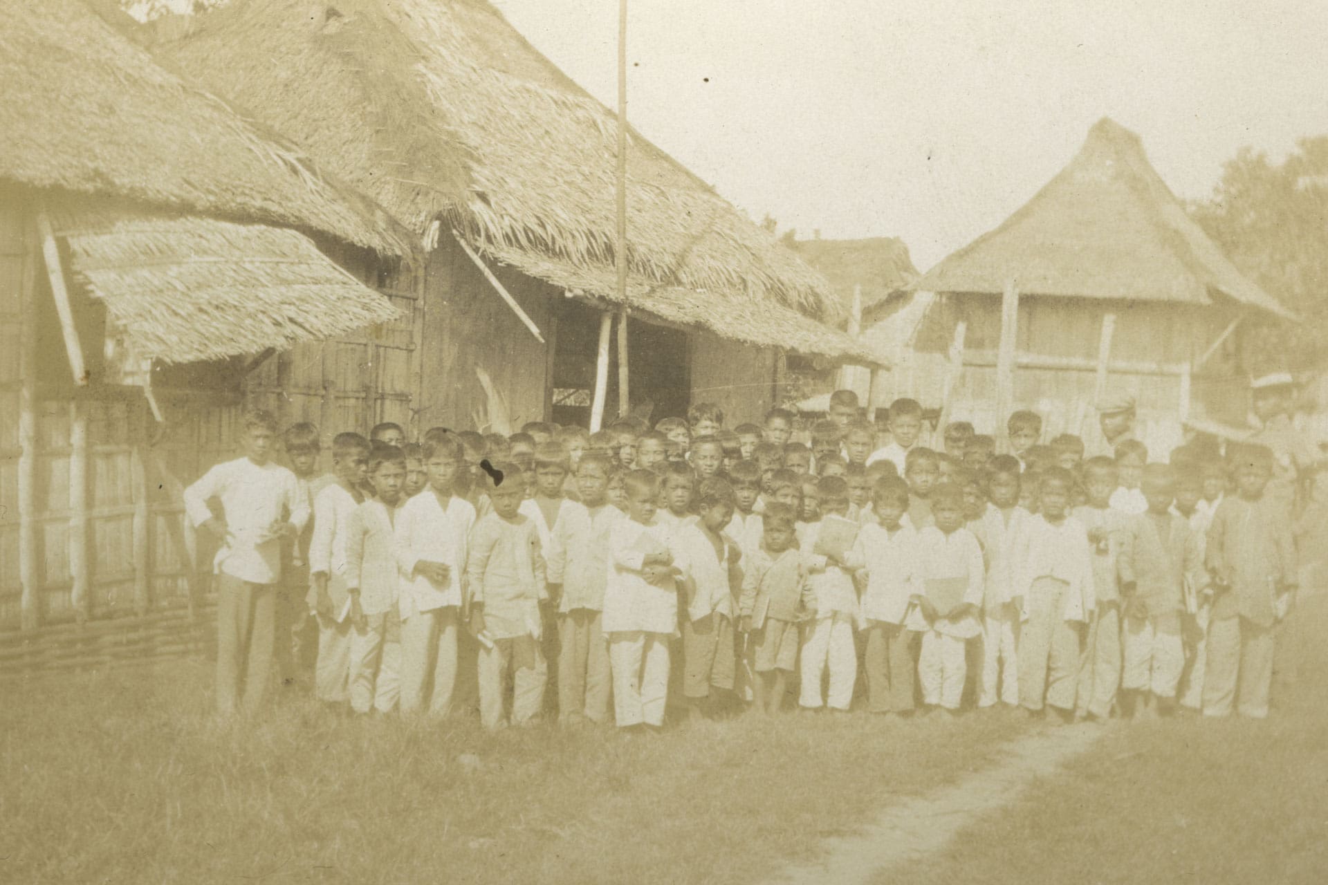 A group of school children in the early twentieth century Philippines.