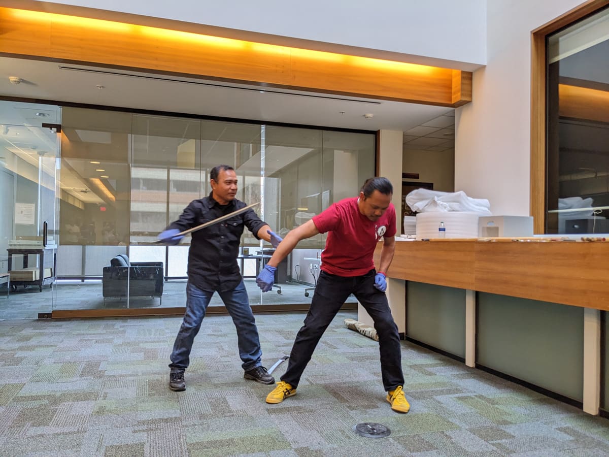 Two men demonstrating martial arts.